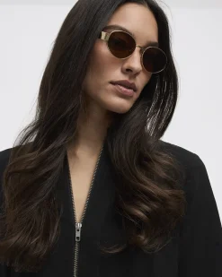 Golden Sunglasses with Oval Lenses
